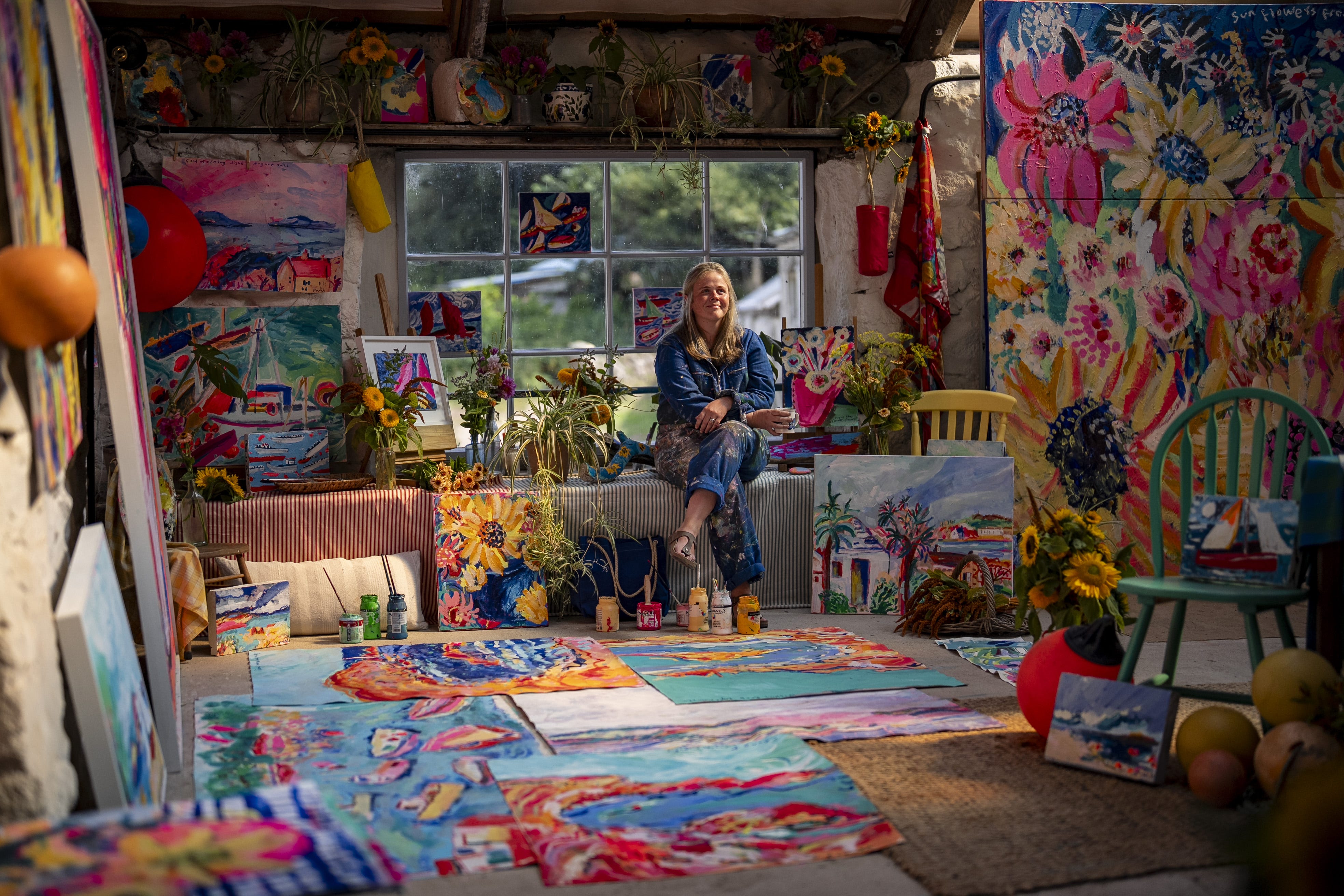 Artist Emily Powell has transformed a former workshop on a farm into her summer studio (Ben Birchall/PA)