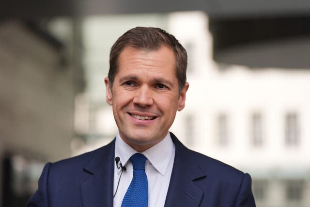 A refugee charity boss has offered an ‘olive branch’ to shadow justice secretary Robert Jenrick after suggesting he was xenophobic (Yui Mok/PA)