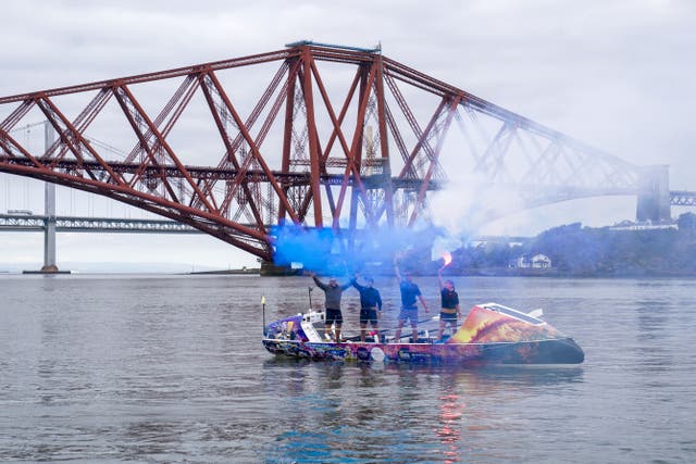 The crew of ROW4MND at the Forth Bridge in South Queensferry, Edinburgh (Jane Barlow/PA)