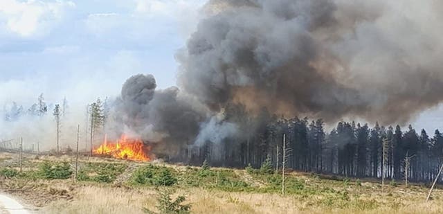 <p>Nine crews are still continuing to tackle the blaze</p>