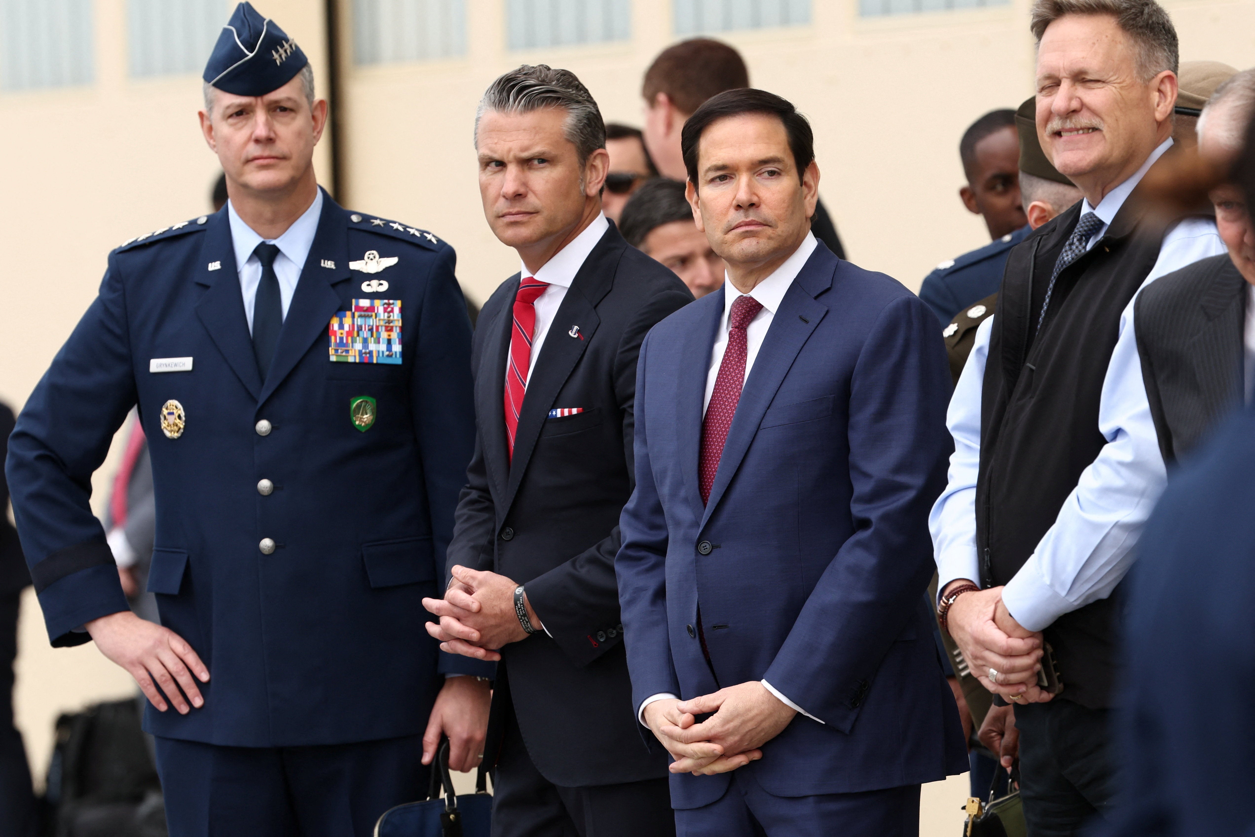 U.S. Secretary of State Marco Rubio stands with Defense Secretary Pete Hegseth, ahead of U.S. President Donald Trump's meeting with Russian President Vladimir Putin to negotiate for an end to the war in Ukraine, at Joint Base Elmendorf-Richardson, in Anchorage, Alaska