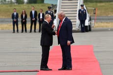 Trump and Putin shake hands as leaders arrive for historic Alaska summit