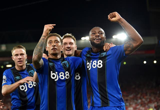 <p>Marcus Tavernier celebrates with Antoine Semenyo</p>