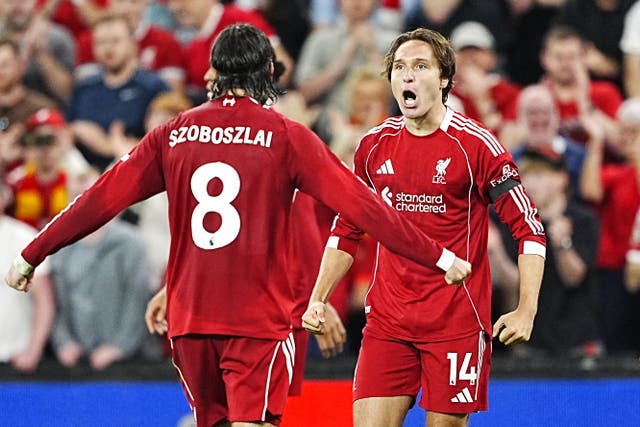 Liverpool’s Federico Chiesa (right) celebrates scoring their side’s third goal of the game with team-mate Dominik Szoboszlai during the Premier League match at Anfield, Liverpool. Picture date: Friday August 15, 2025.