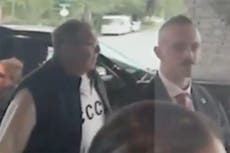 Russian foreign minister wears USSR jumper as he arrives at Trump-Putin summit in Alaska
