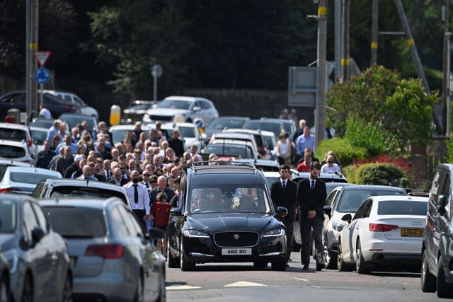 Mourners attend the funeral of Stephen Brannigan at St Brigid’s church in Downpatrick (Mark Marlow/PA)