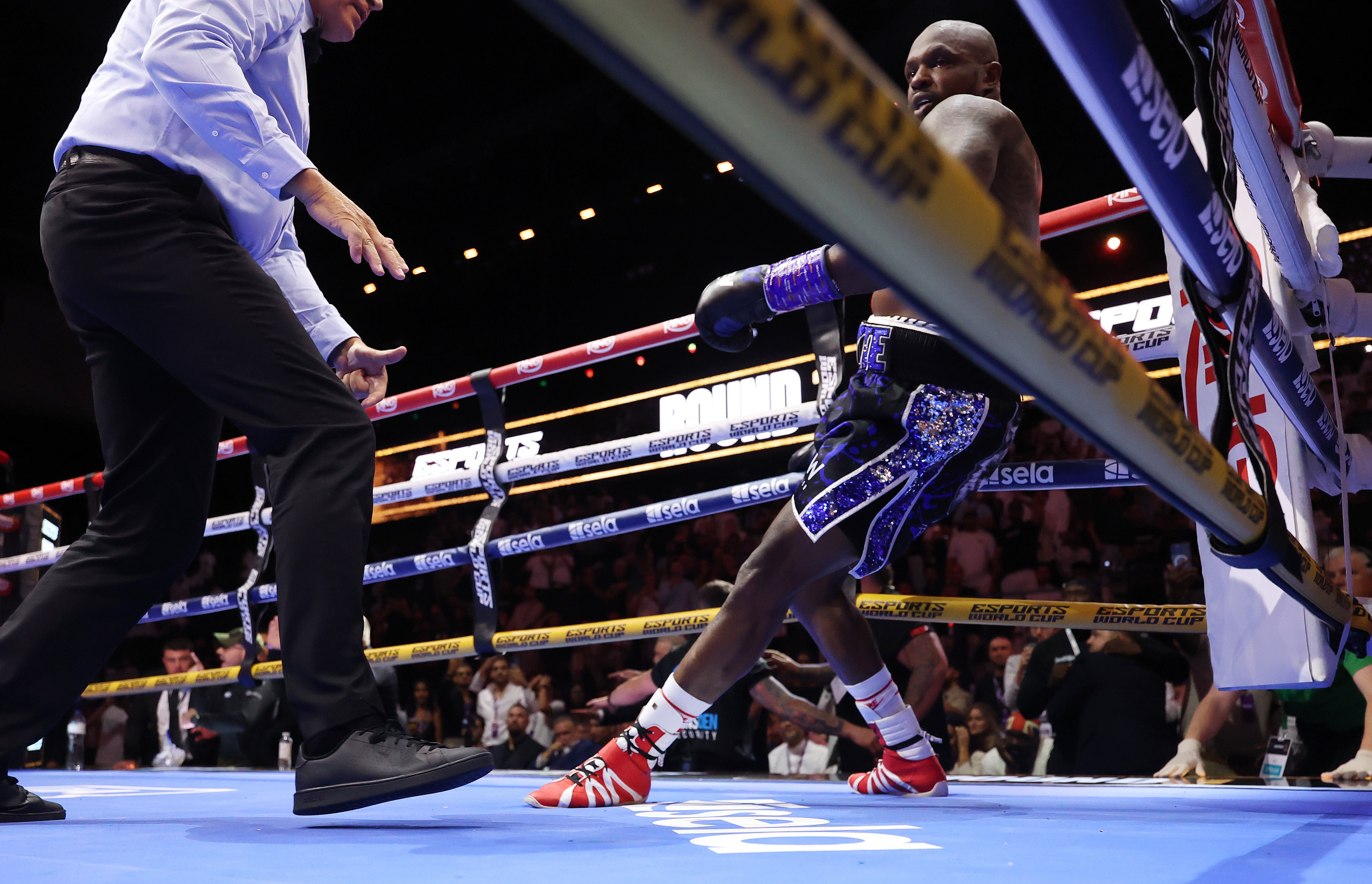 Whyte beat the count but stumbled into the corner