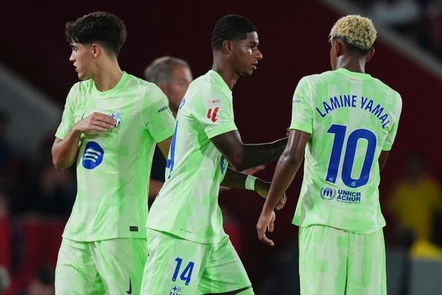 <p>Marcus Rashford, centre, made his debut for Barcelona off the bench against Mallorca (Joan Mateu Parra/AP)</p>