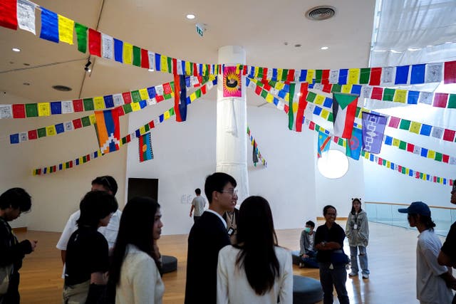 <p>People attend the exhibition titled Constellation of Complicity: Visualising the Global Machinery of Authoritarian Solidarity at the Bangkok Arts and Cultural Centre </p>
