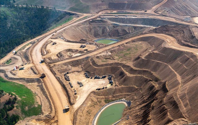 <p>This image provided by EcoFlight shows an aerial view of the terraced structure of the Wharf gold mine in the Black Hills on Tuesday, May 23, 2023</p>