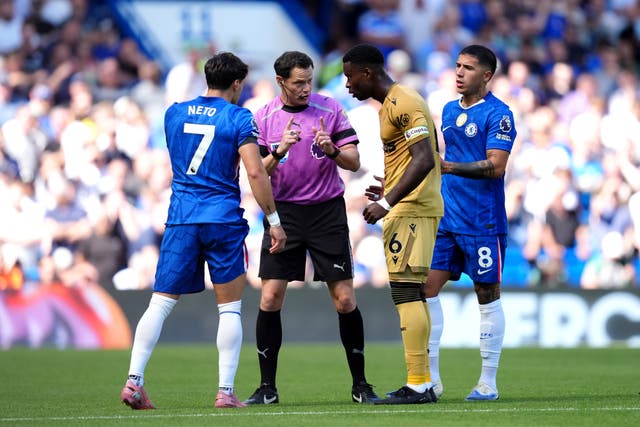 <p>Referee Darren England explains to Marc Guehi why the goal was disallowed</p>
