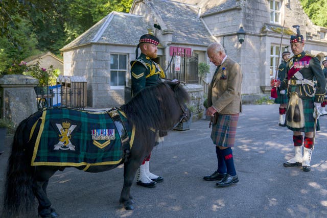 King Charles III meets Shetland pony Cpl Cruachan IV (mascot of the Royal Regiment of Scotland) (Jane Barlow/PA Wire).