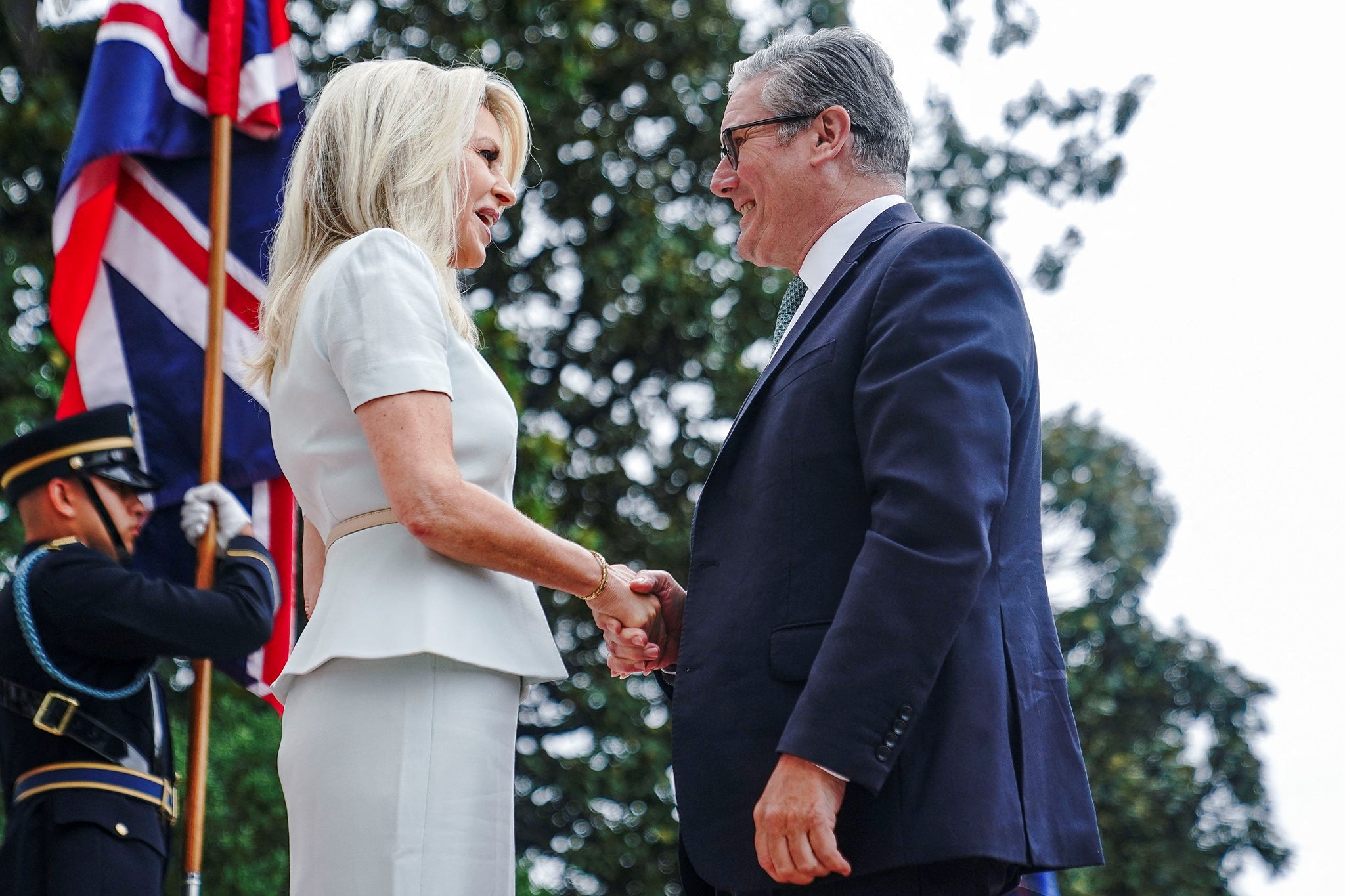 British Prime Minister Keir Starmer is greeted by U.S. Chief of Protocol Monica Crowley as he arrives at the White House