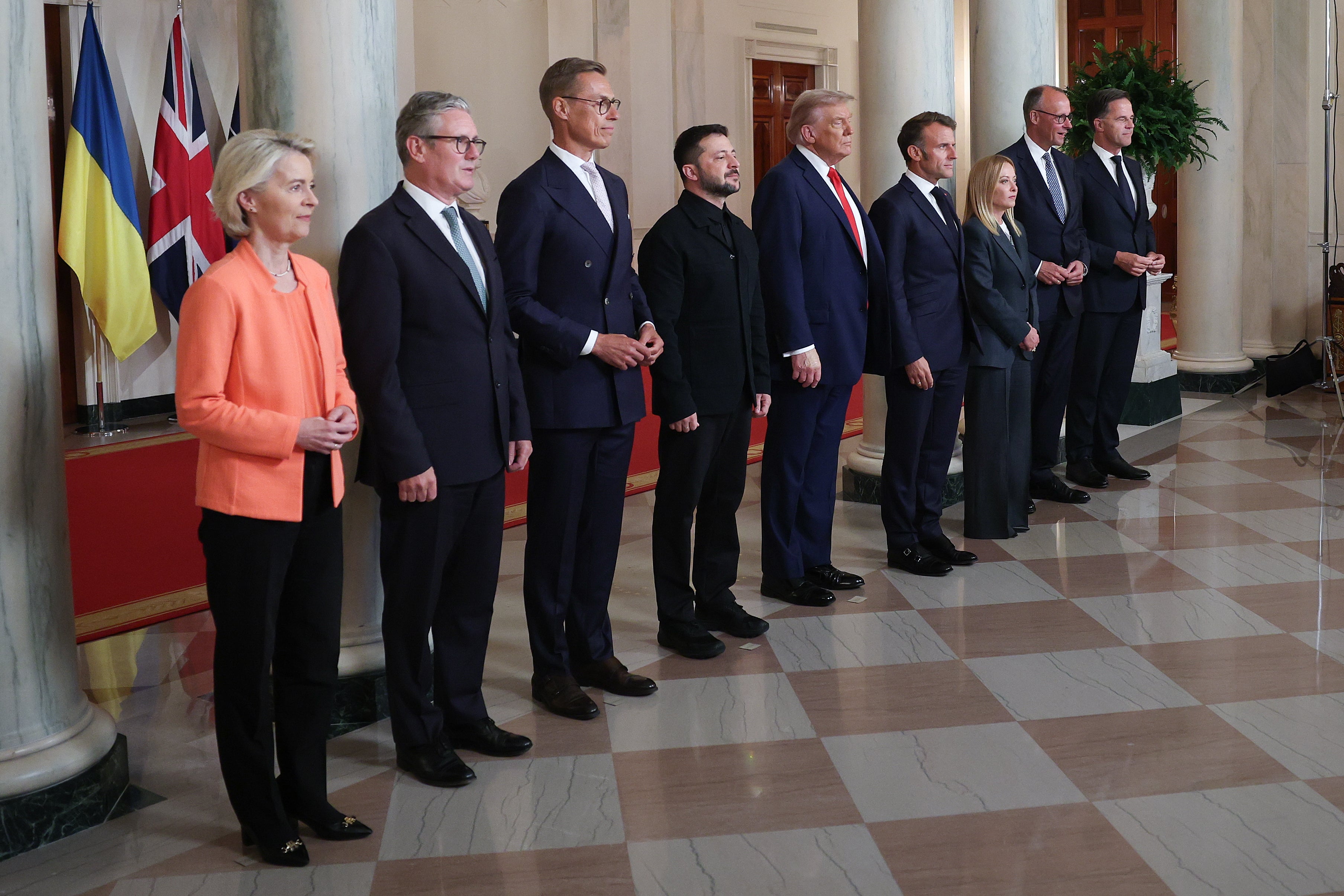 President Donald Trump, Ukrainian President Volodymyr Zelensky and other European leaders pose for a group photo prior to meeting at the White House at the White House on August 18 in Washington, DC.