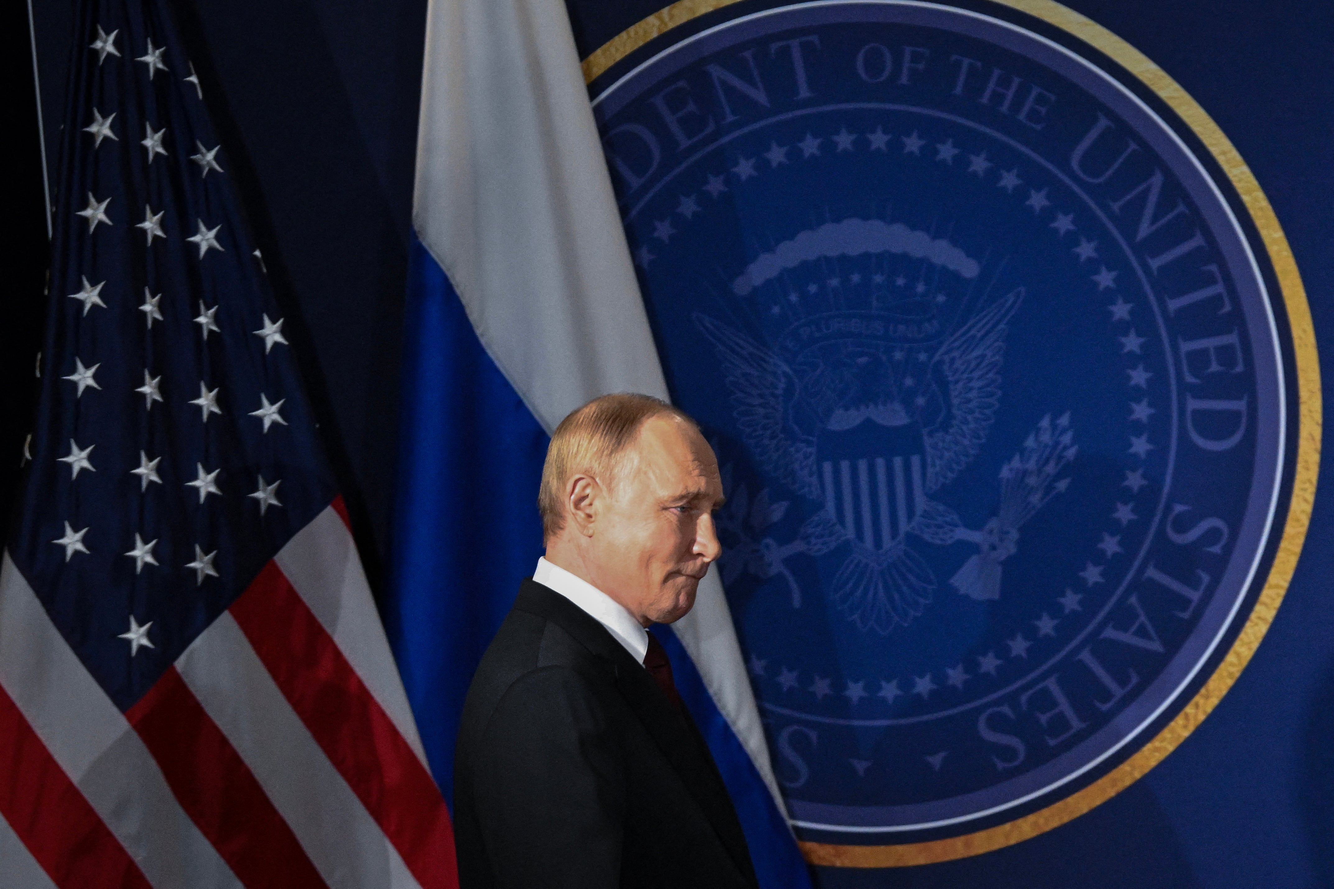 Russian president Vladimir Putin arrives for a joint press conference with the US president after participating in a US-Russia summit on Ukraine at Joint Base Elmendorf-Richardson in Anchorage