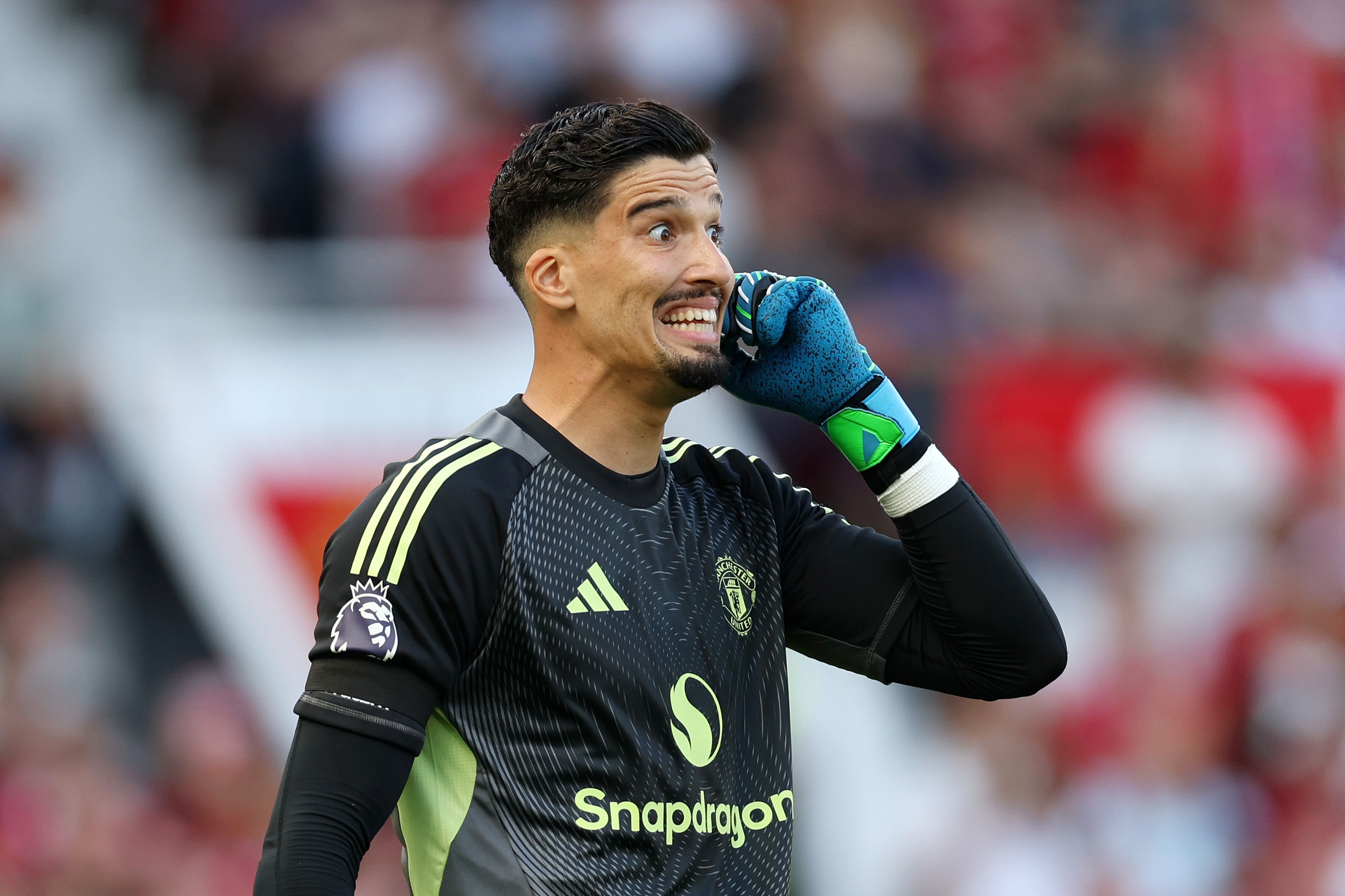 Altay Bayindir of Manchester United reacts against Arsenal