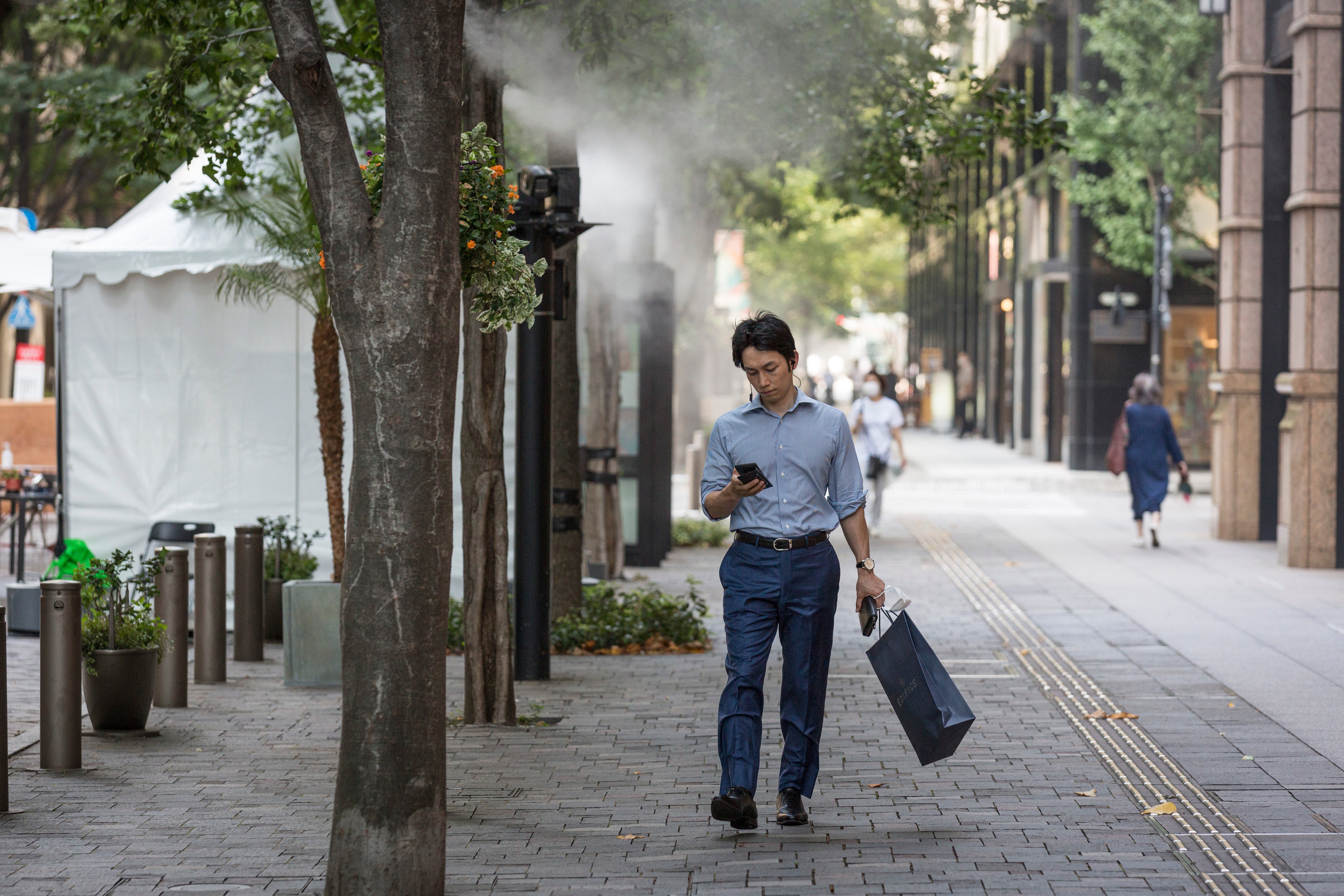 A mist cooling system at work in Tokyo, where temperatures frequently hit the high 30s in the summer
