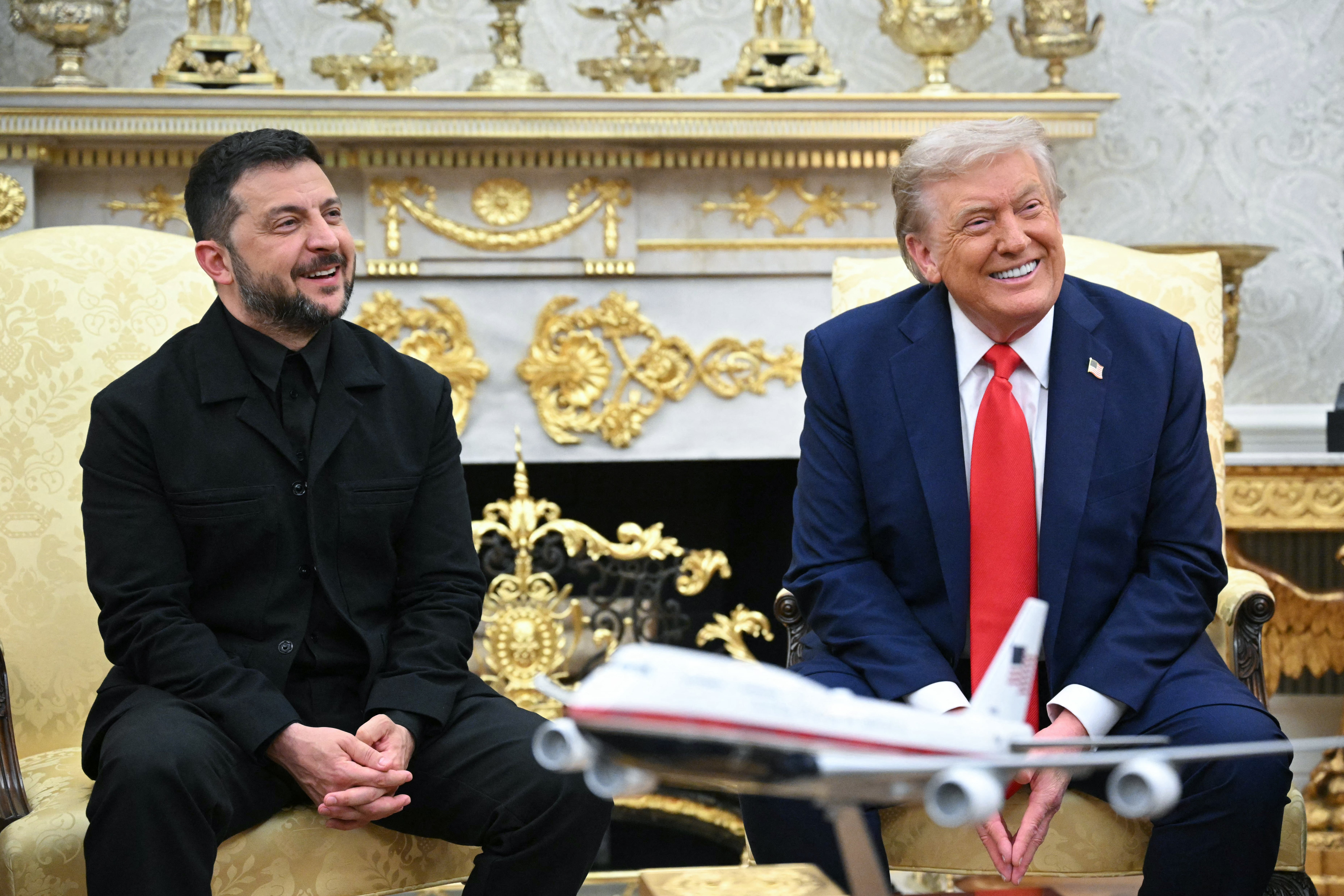 Ukrainian President Volodymyr Zelensky and US President Donald Trump participate in a meeting in the Oval Office at the White House