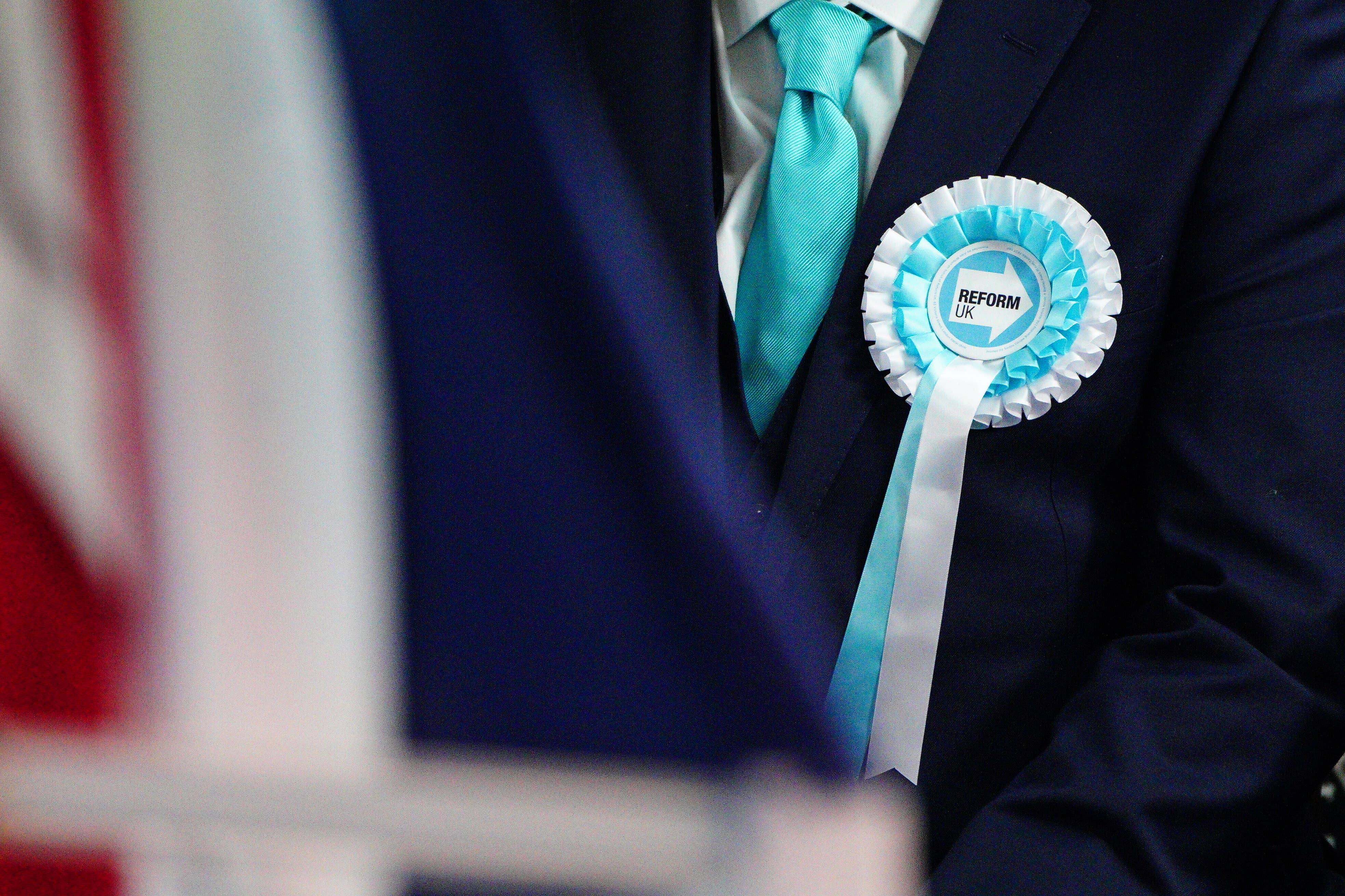 A Reform rosette (Ben Birchall/PA)
