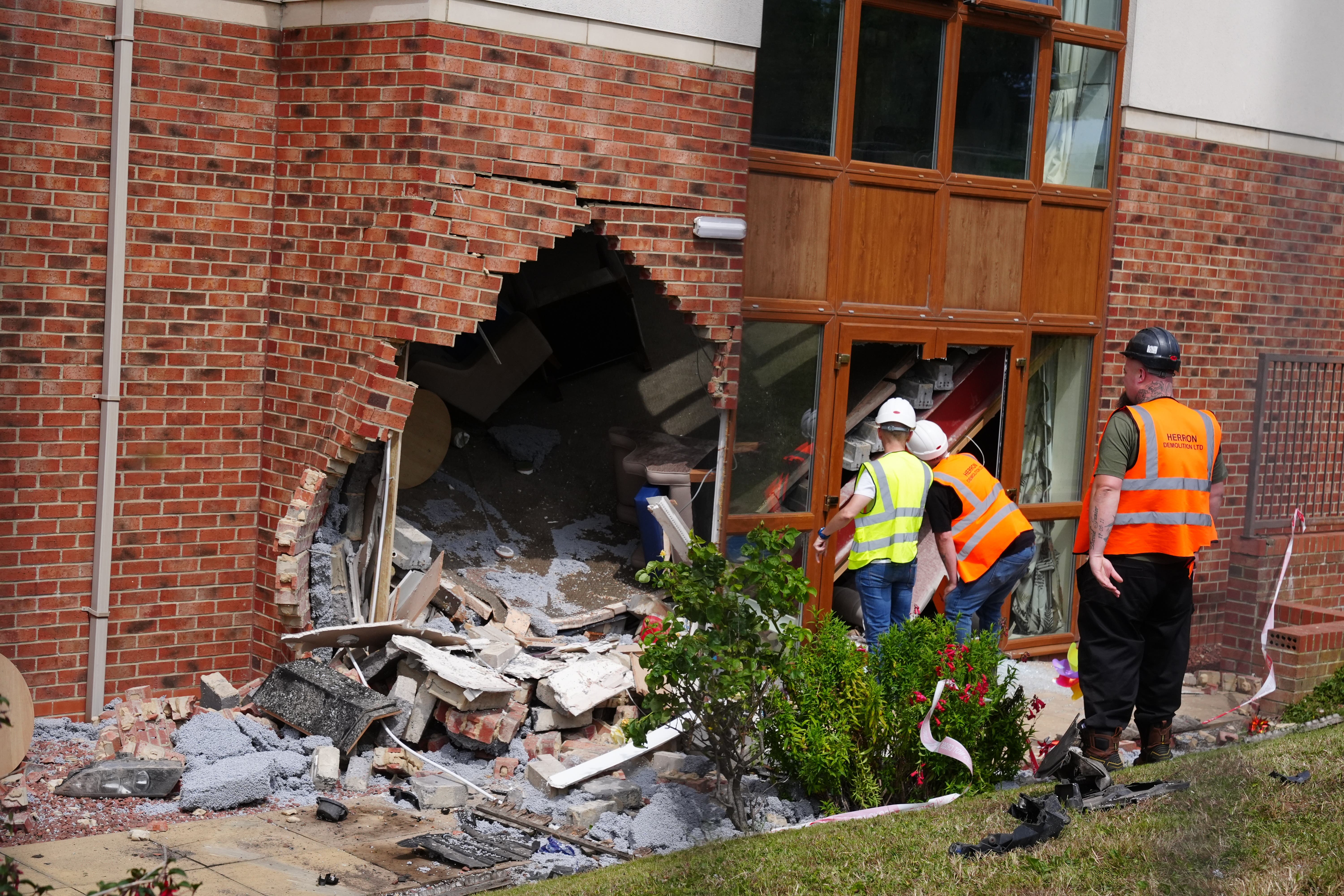 The scene outside Highcliffe Care Home in Witherwack, Sunderland, after the car collided into the building during a police pursuit (Owen Humphreys/PA)