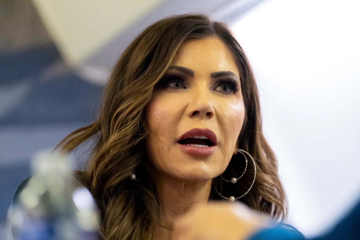 https://static.independent.co.uk/2025/08/19/13/21/U-S--Homeland-Security-Secretary-Kristi-Noem-speaks-with-a-reporter-on-her-plane-while-in-the-air-en.jpeg?width=1200&height=800&crop=1200:800