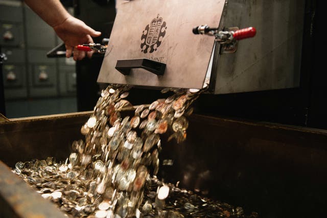 <p>The King Charles III coins being struck at the Royal Mint</p>