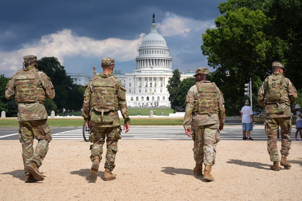 National Guard vehicle collides with civilian car near US Capitol, trapping one person