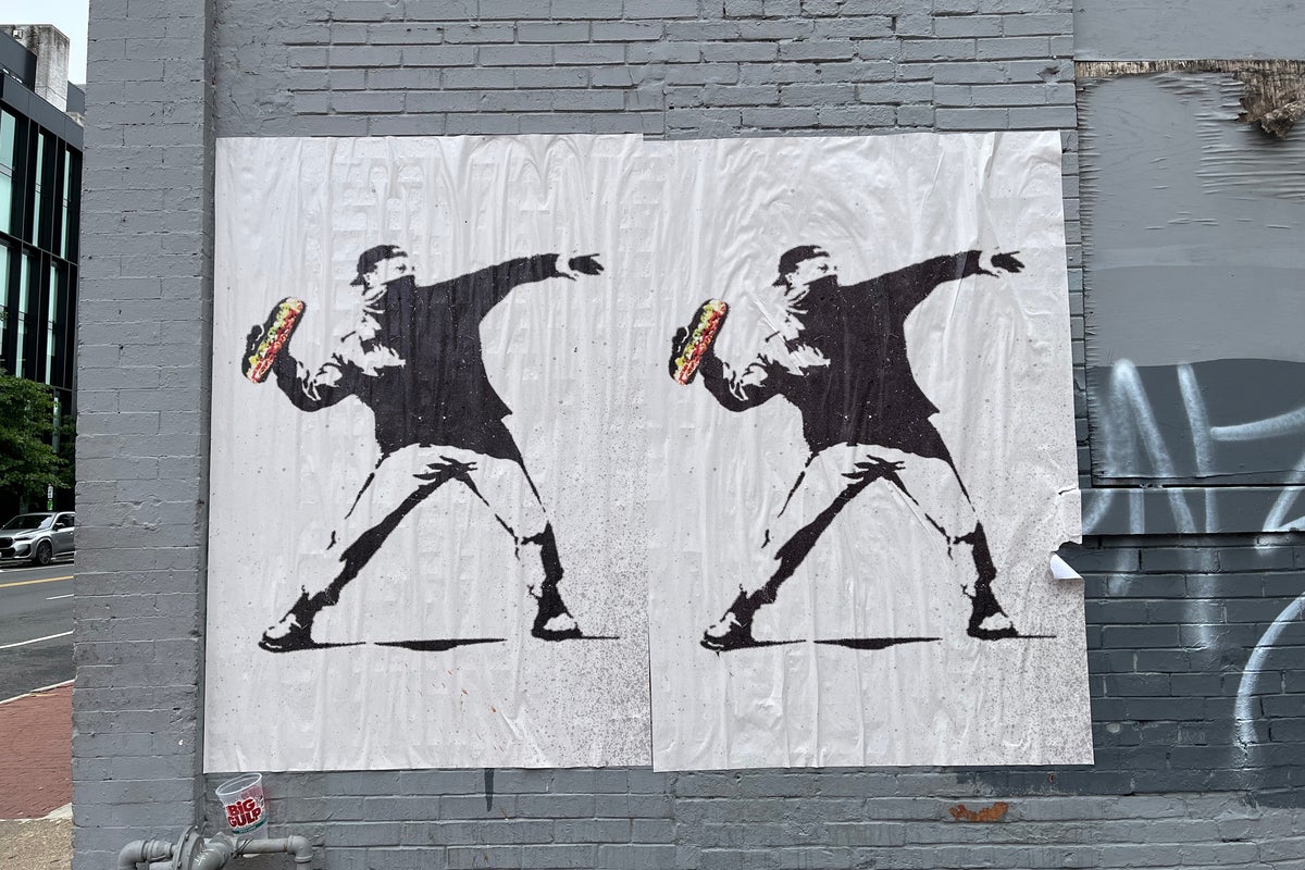 Federal agents arrested a protester for throwing a sandwich at them. Now artists are turning him into a resistance icon on the walls of DC
