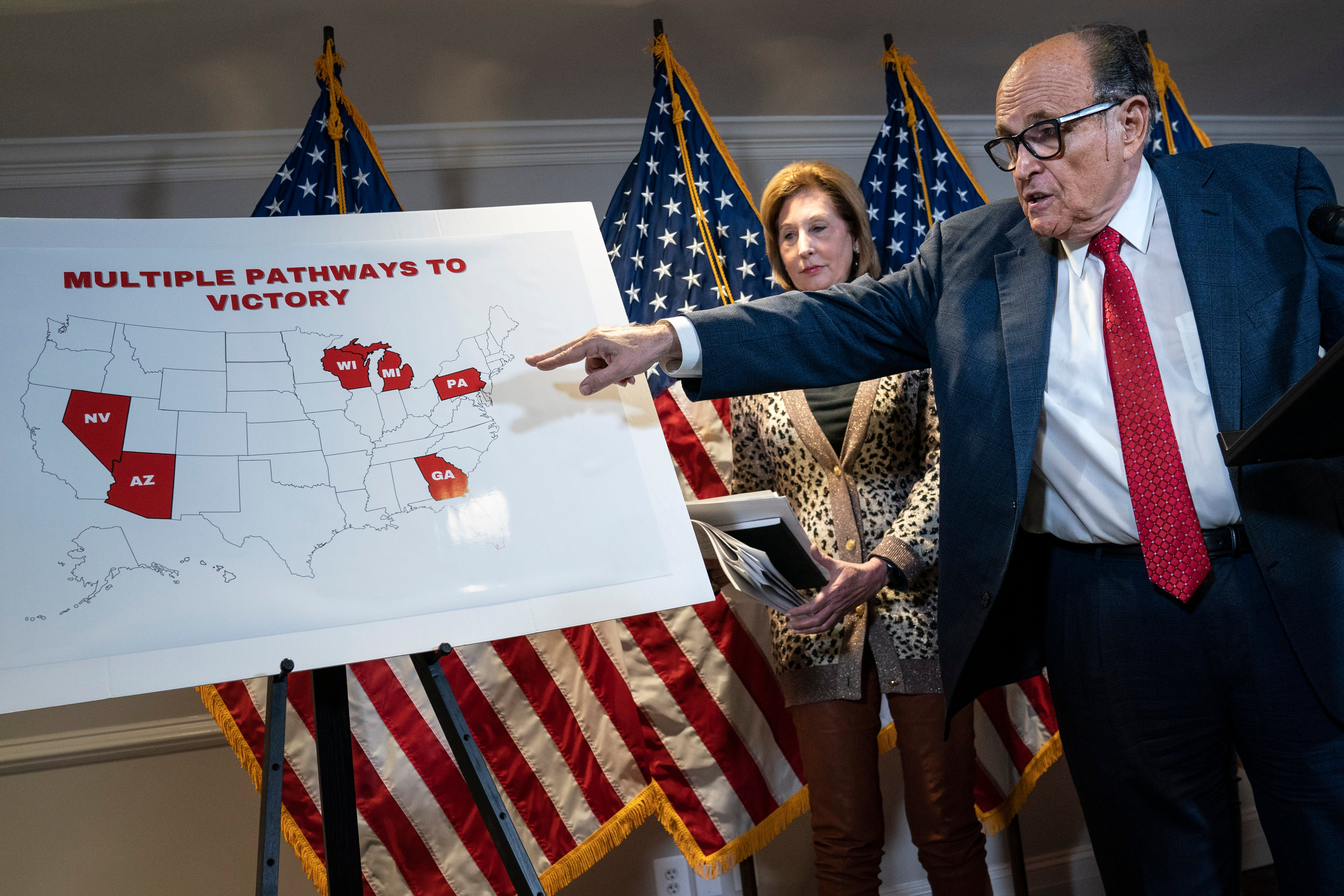 Sidney Powell and Rudy Giuliani, campaign surrogates for President Donald Trump, questioned the results of the 2020 election in a series of failed legal challenges and conspiracy theories, many involving voting machines