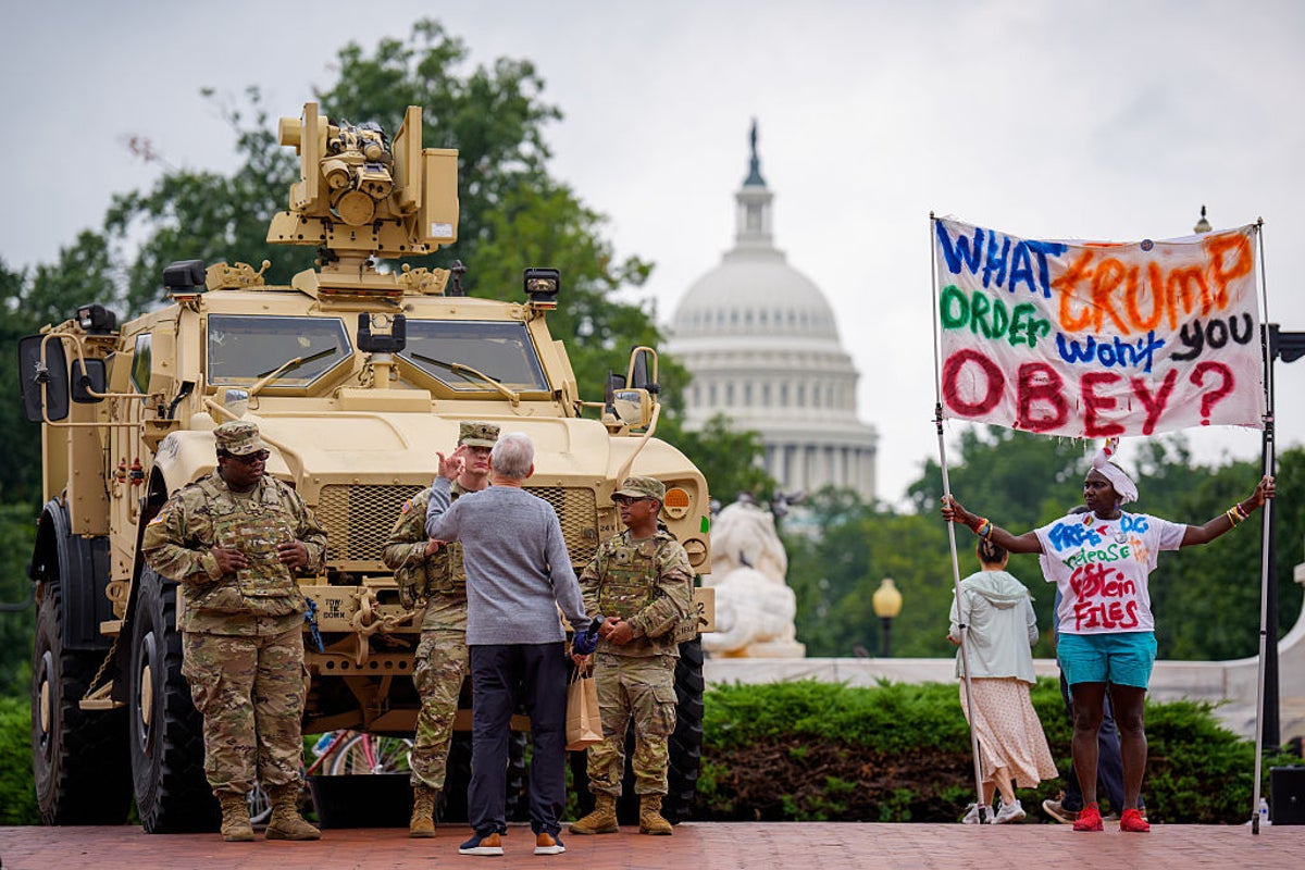 Trump battles sinking public image over DC takeover while National Guard pose with tourists