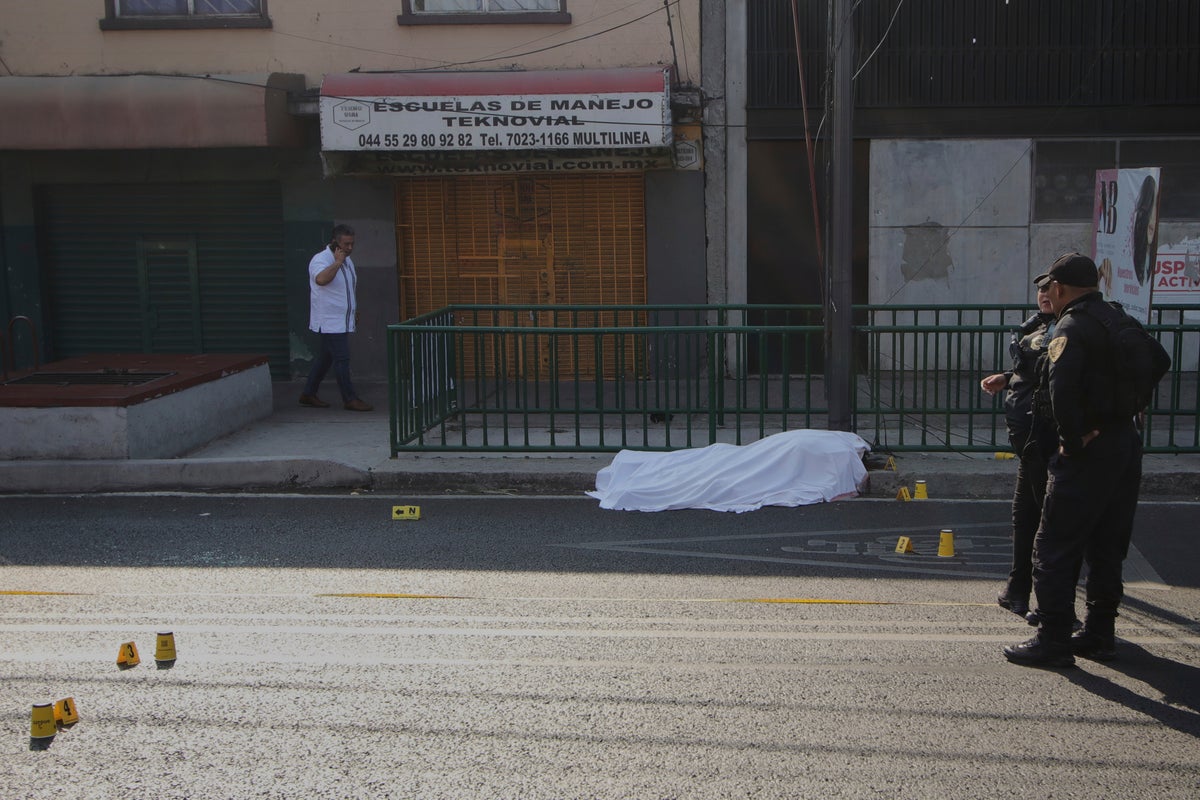 Mexico City mayor says police arrest 13 in connection with killings of her staffers