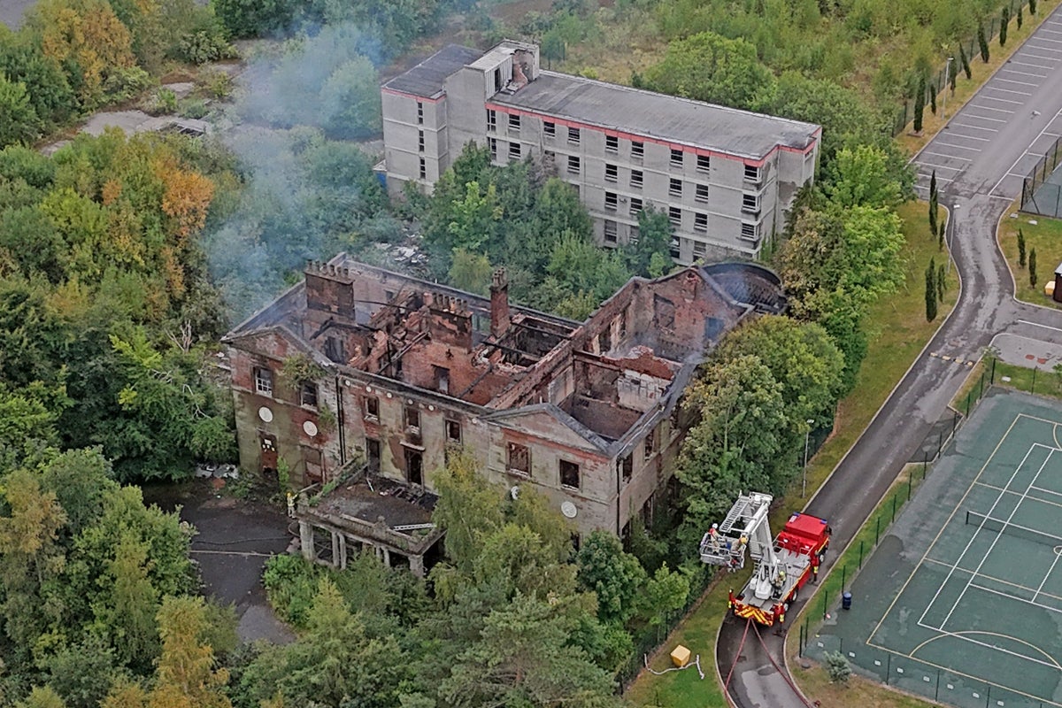 Girl, 14, arrested after fire at Grade I-listed Woolton Hall in Liverpool