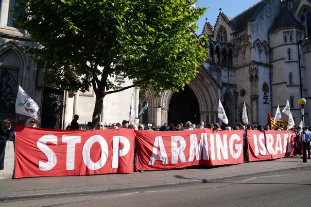 Demonstrators outside the Royal Courts of Justice, ahead of the High Court hearing earlier this year (Ben Whitley/PA)
