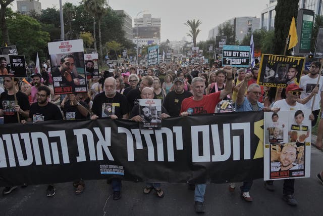 <p>Relatives and supporters of hostages held by Hamas take part in a protest demanding their immediate release and calling for an end to the war in the Gaza Strip, in Tel Aviv on Thursday</p>