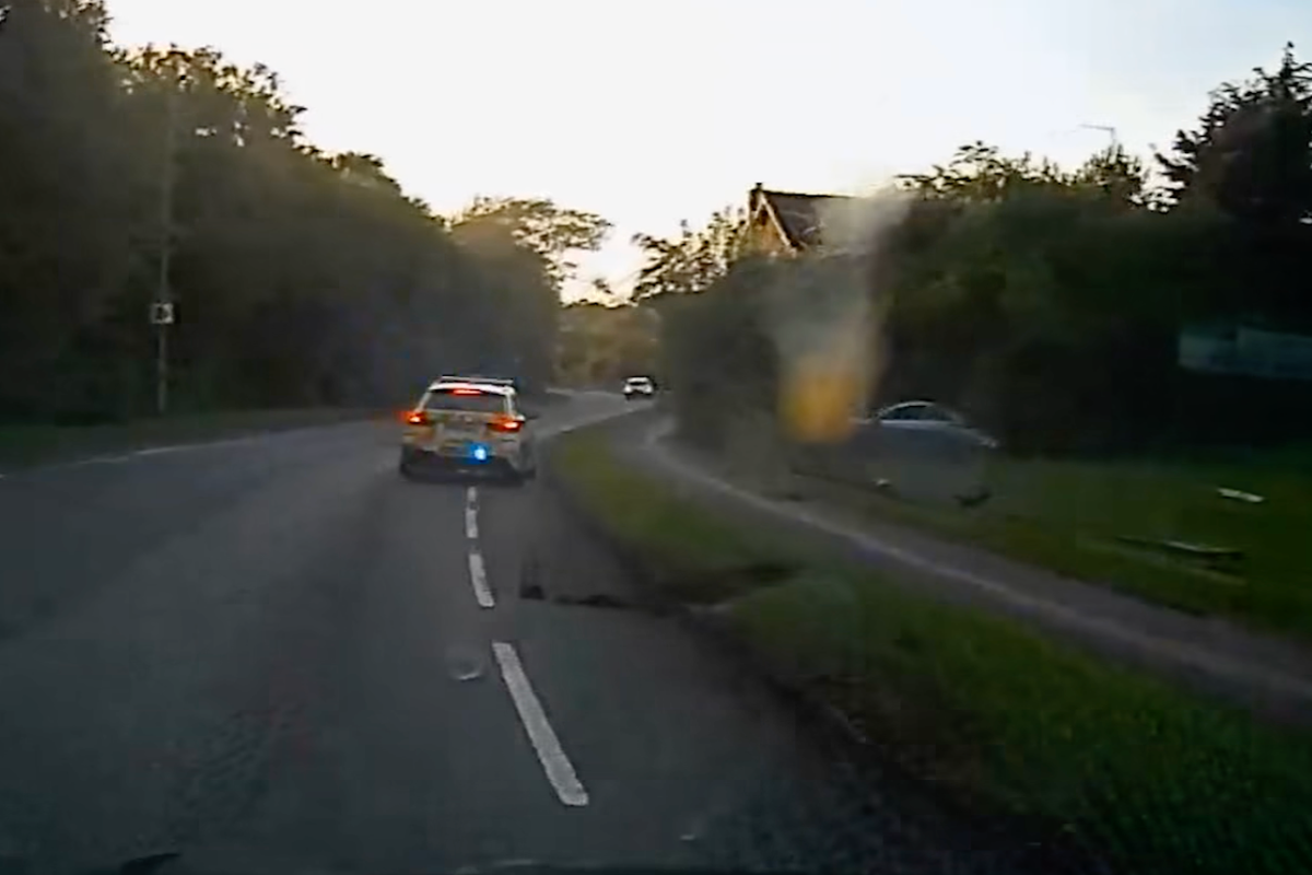 Mercedes crashes in garden following high speed police pursuit