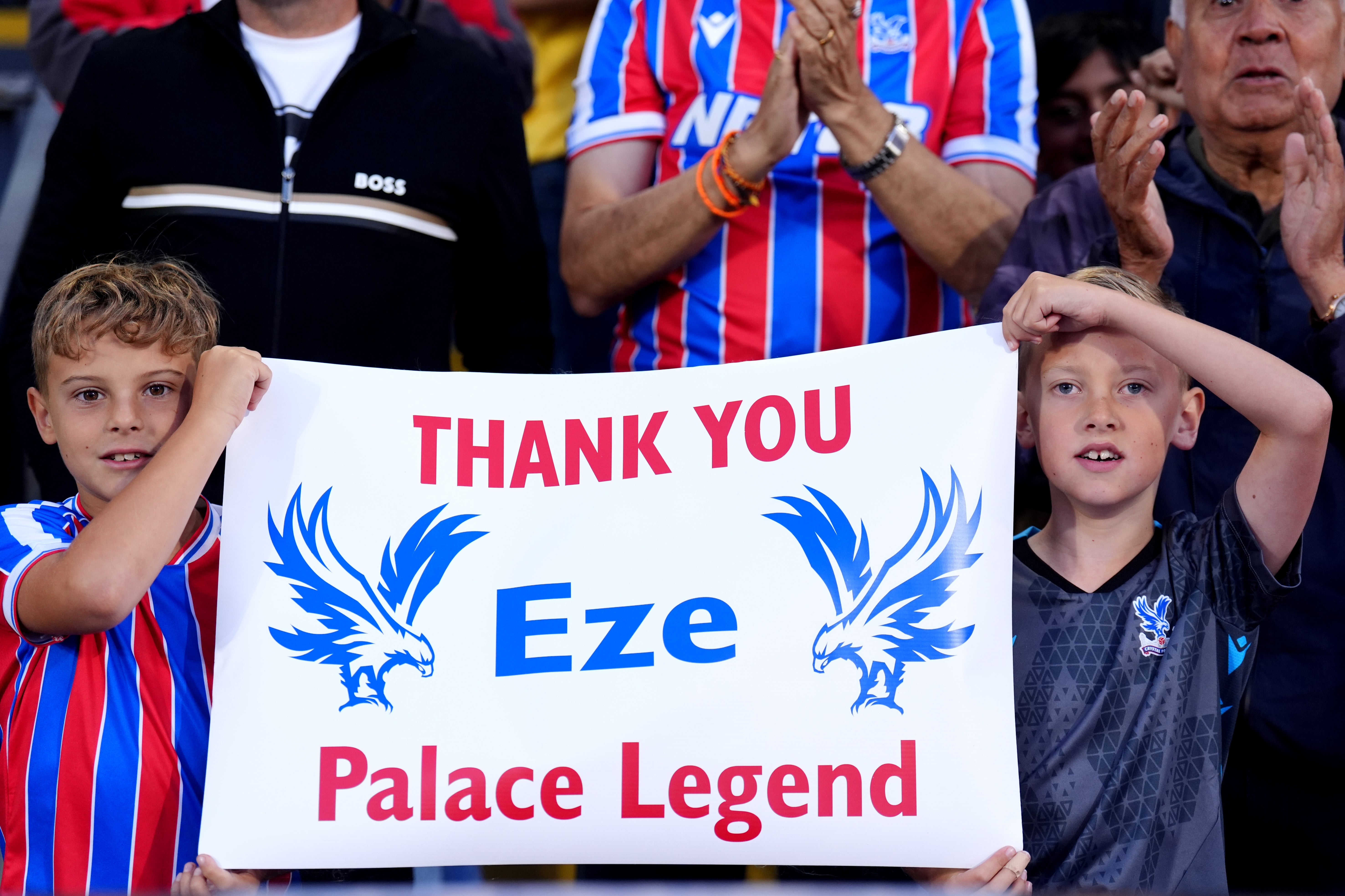 Crystal Palace fans hold up a sign thanking Eberechi Eze ahead of his imminent departure