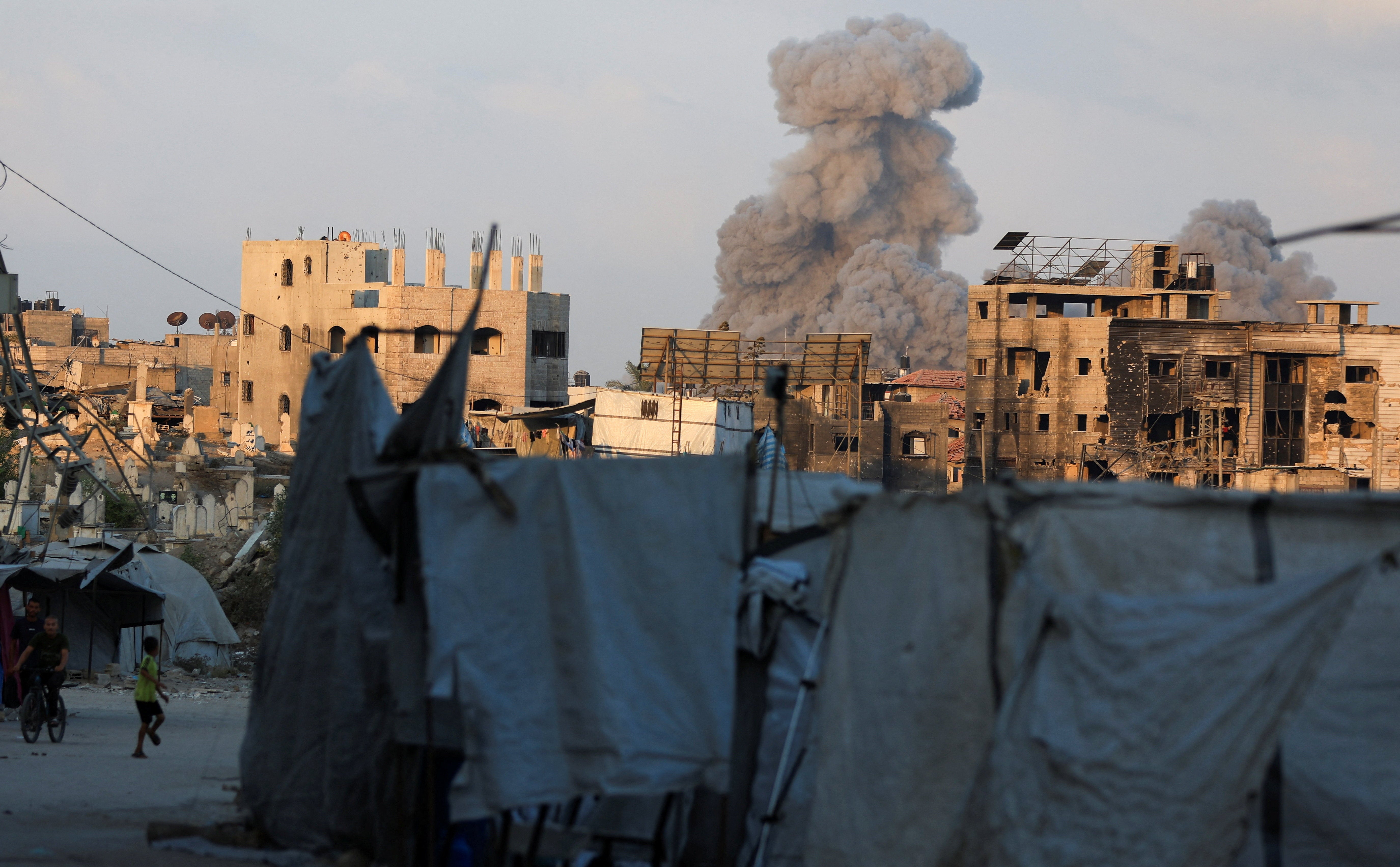 Smoke rises following an Israeli strike, in Gaza City