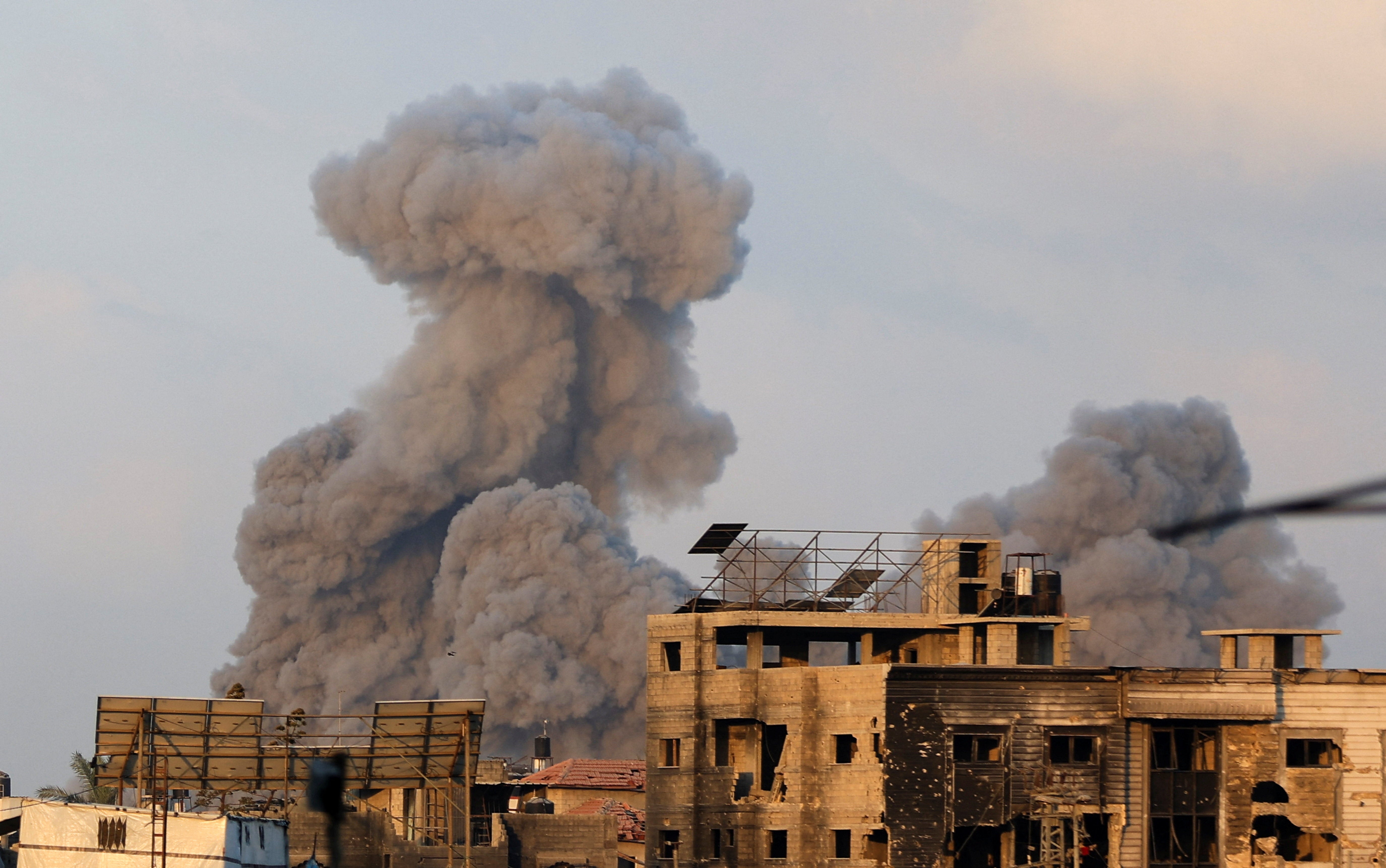 Smoke rises following an Israeli strike, in Gaza City