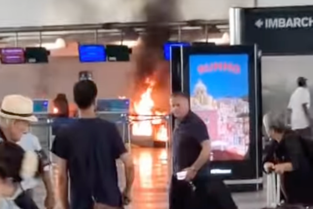 Passengers flee after man sets fire to Milan airport check-in desk