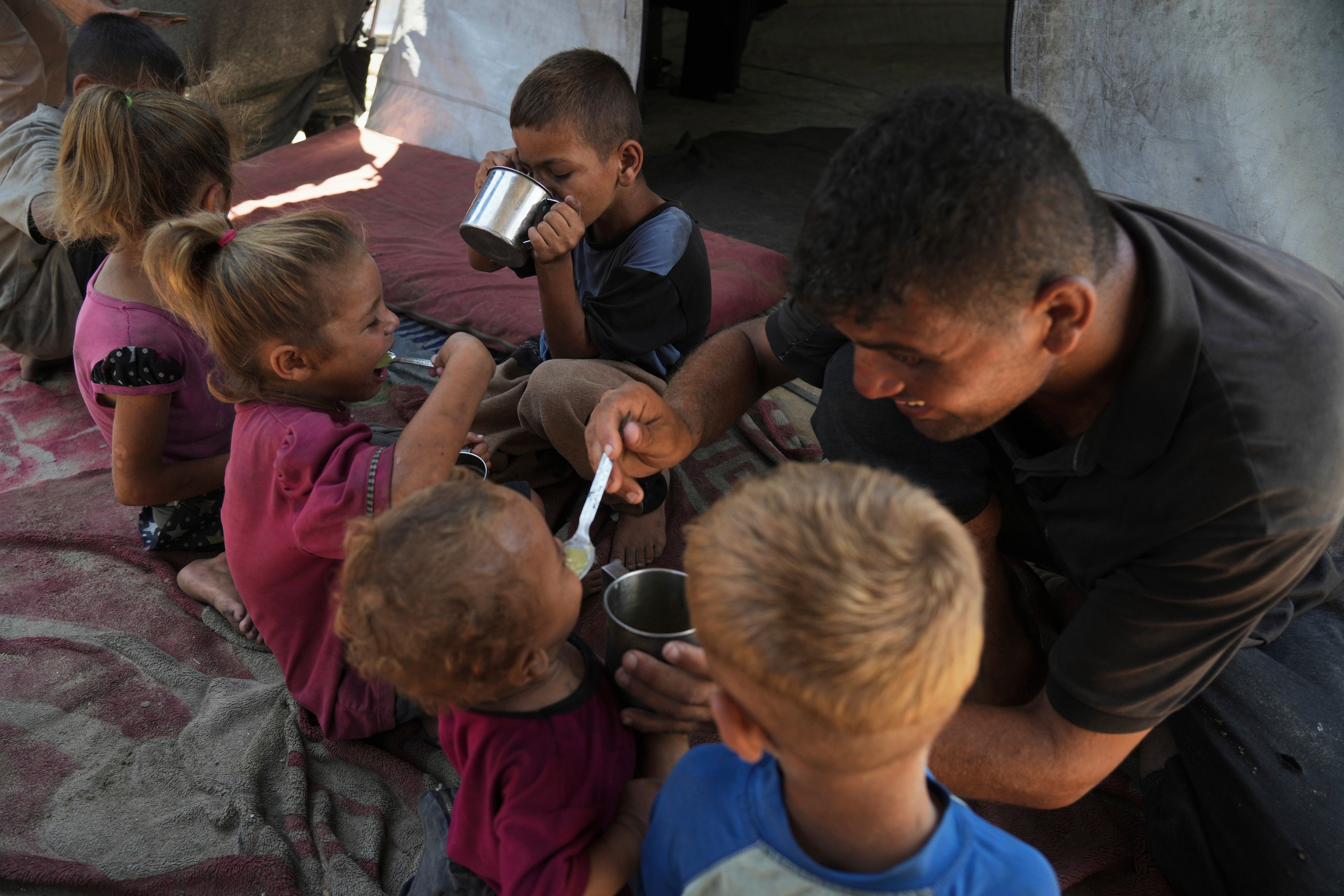 Mideast Wars Gaza Famine Photo Gallery
