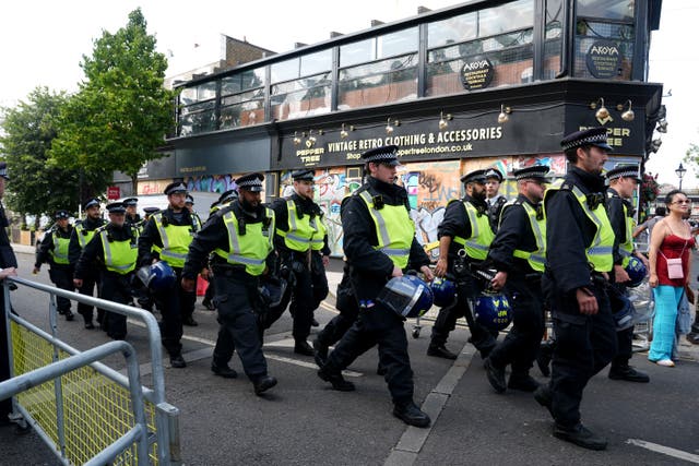 Police officers on Ladbroke Grove at the Notting Hill Carnival last year (Lucy North/PA)