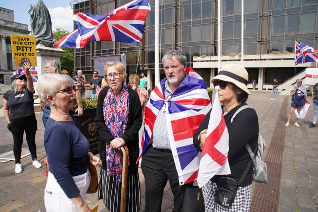 People take part in a counter protest at the Stand Up To Racism rally in Portsmouth (Gareth Fuller/PA)
