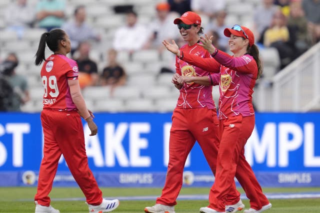 Shabnim Ismail (left) celebrates a match-winning turn for Welsh Fire (Nick Potts/PA)