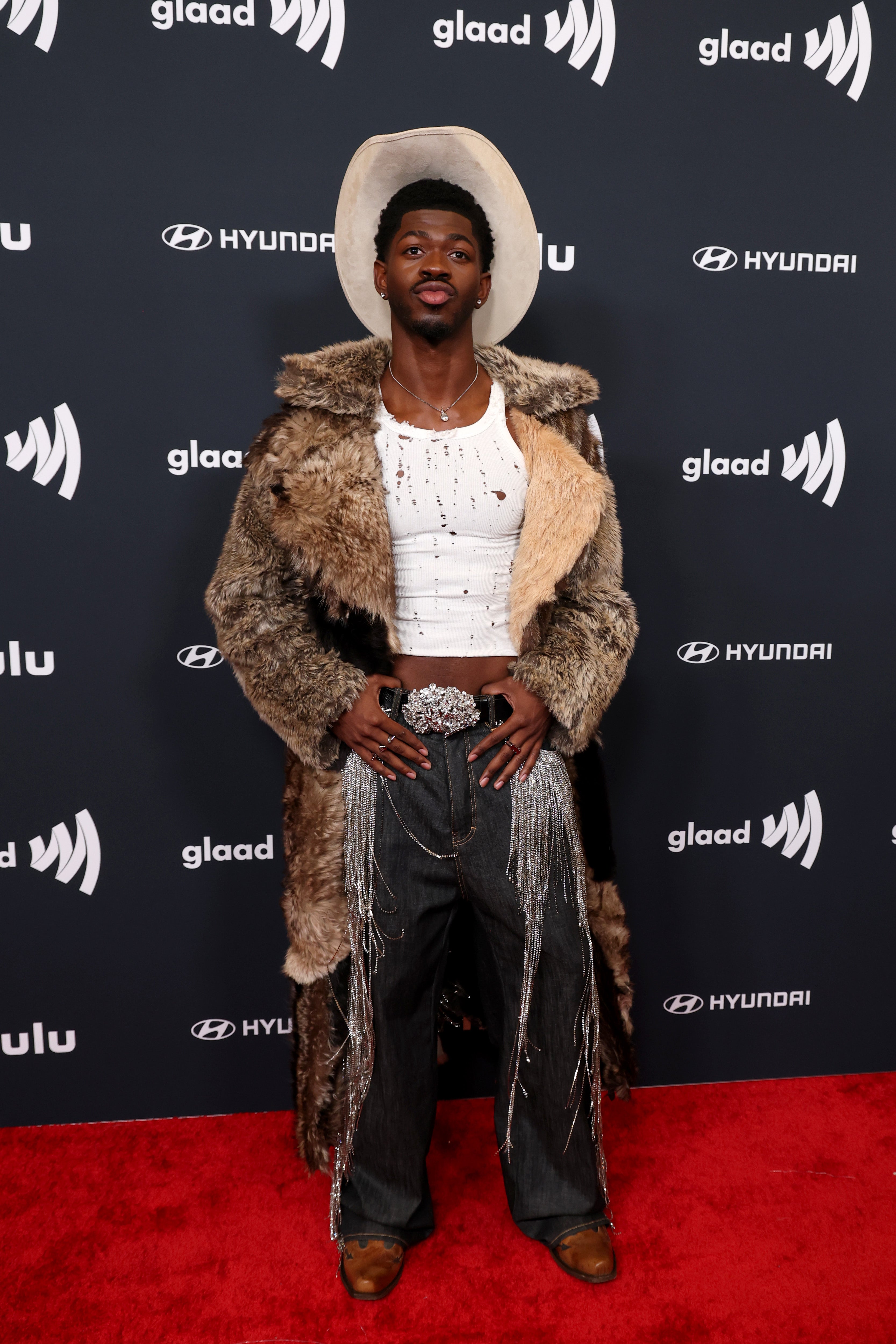 Rapper Lil Nas X has been hospitalized over a suspected overdose and jailed on suspicion of charging at police on a Los Angeles street, according to the cops