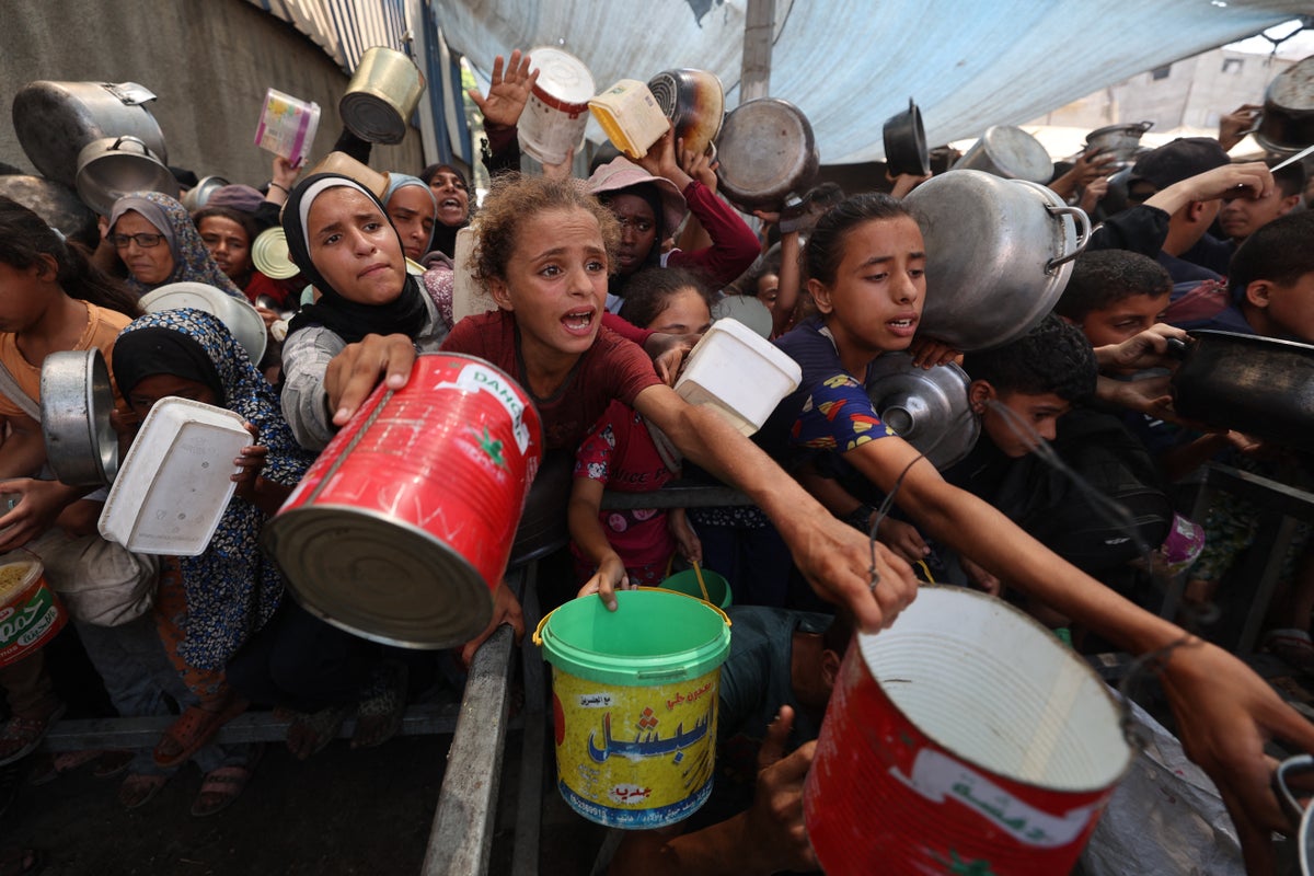 Women and children among 25 killed in new Israeli strikes as famine declared