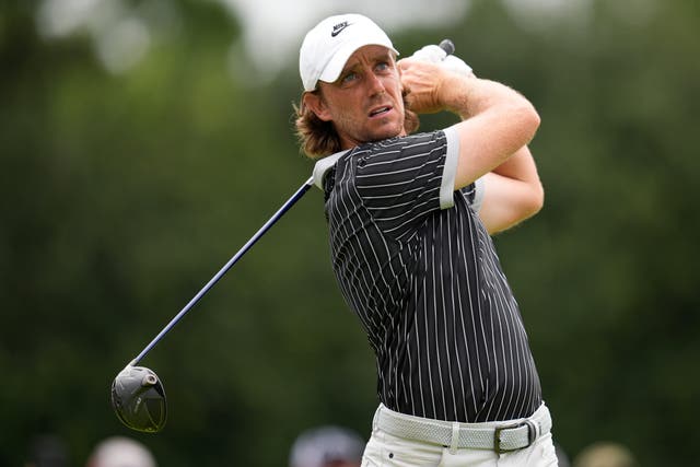 Tommy Fleetwood, of England, hits from the 18th tee during the second round of the Tour Championship golf tournament (Mike Stewart/AP)