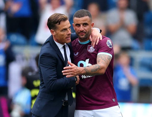 <p>Scott Parker and Kyle Walker celebrate Burnley’s first win of the season</p>