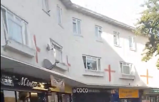 <p>The flags were painted on the walls of homes in Basildon, Essex</p>