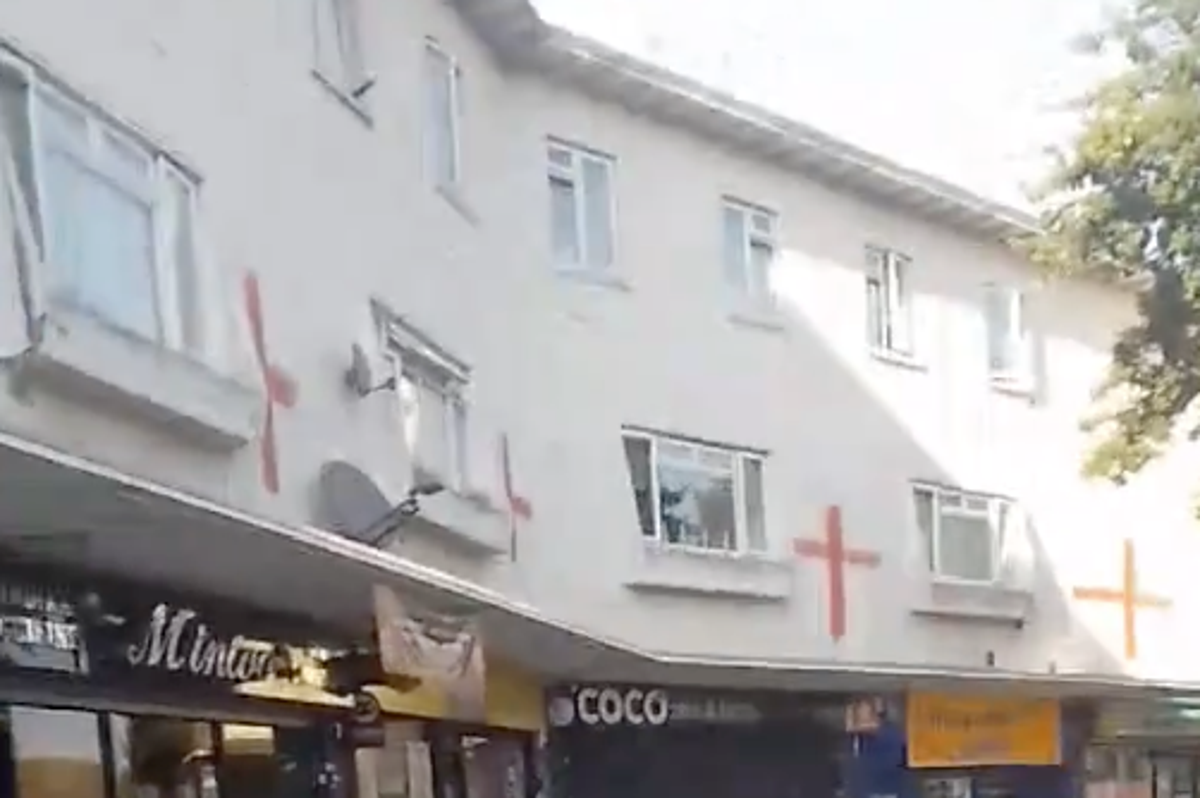 Man arrested after woman racially abused while England flags were painted on homes in Essex