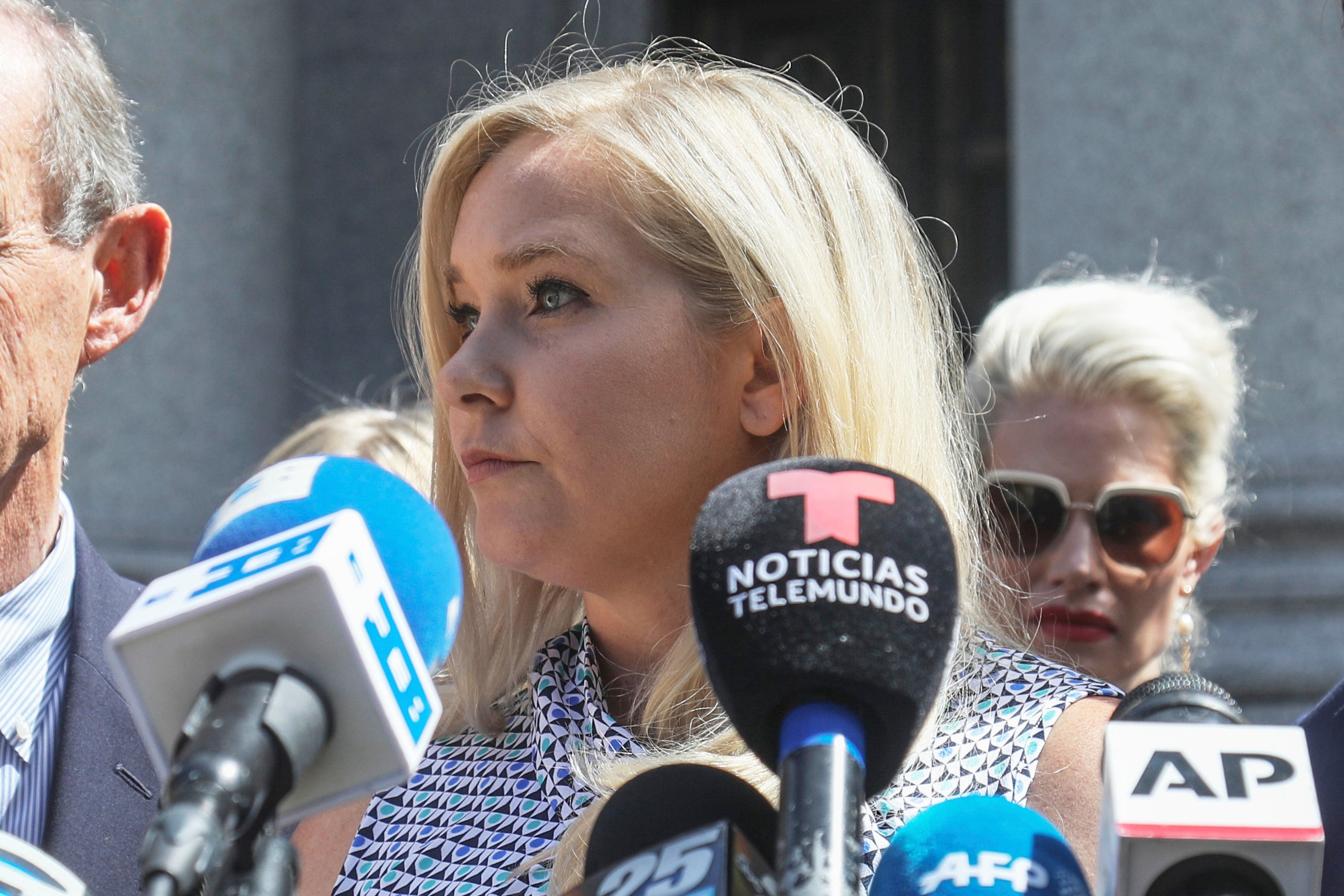 Virginia Giuffre taking questions from reporters in New York in August 2019